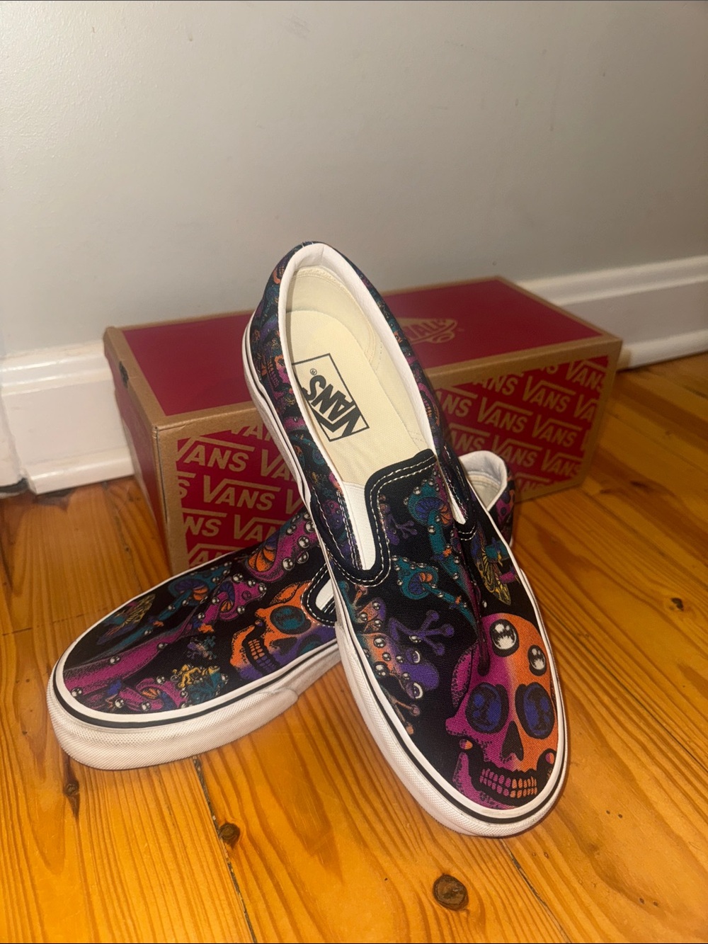 Vans Slip-On Sneakers with Purple and Orange Skull Print